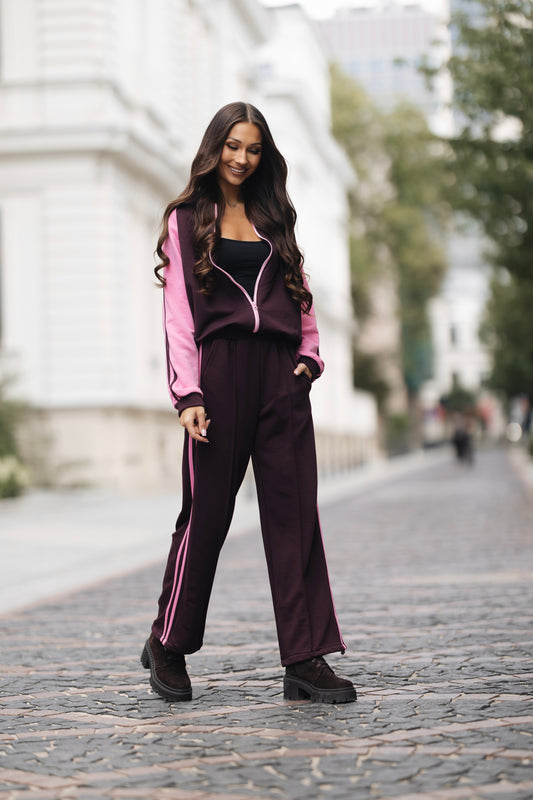 Completo tuta donna con maniche rosa e pantaloni ampi, vista intera